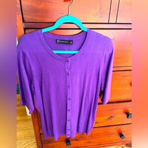 Short sleeved 100 cotton.  Large.  Great for covering sleeveless dresses.